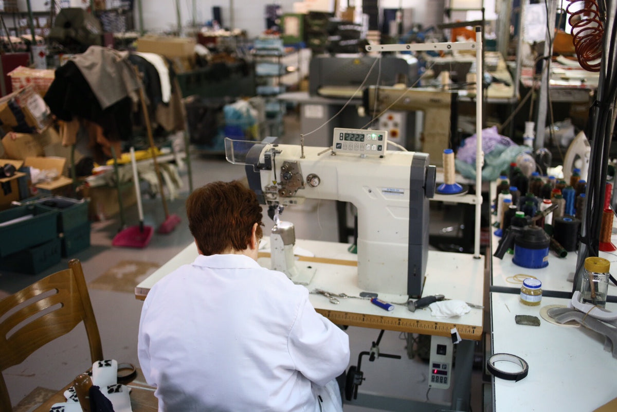 A Galiano artisan working at the sewing machine